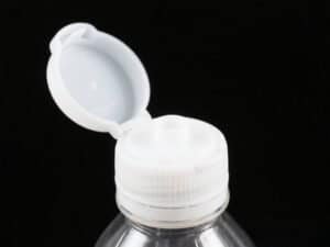 Plastic flip top caps
